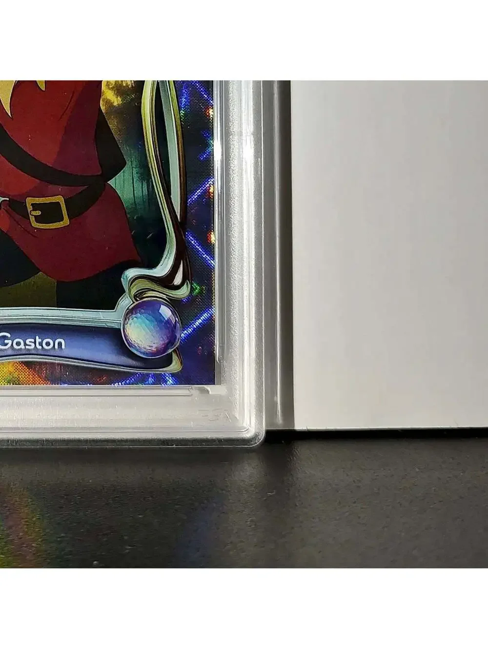 Gaston 2025 Topps Disney #45 Winter Variant Card Beauty and the Beast PSA 8
